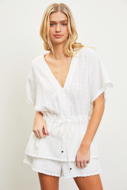 The Coastal Ease Peplum Top