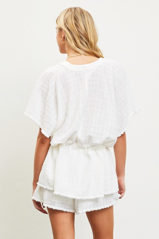 The Coastal Ease Peplum Top